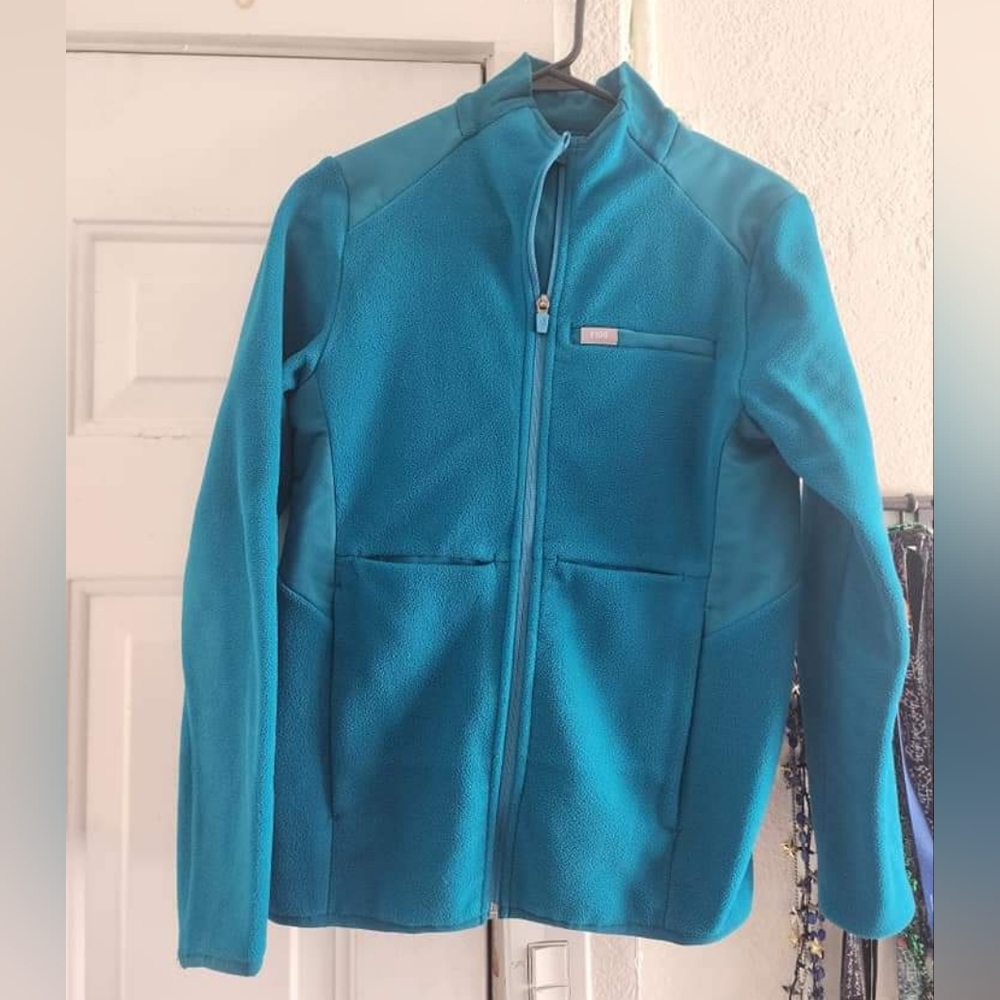 figs on shift pacific blue performance fleece jacket size XS.